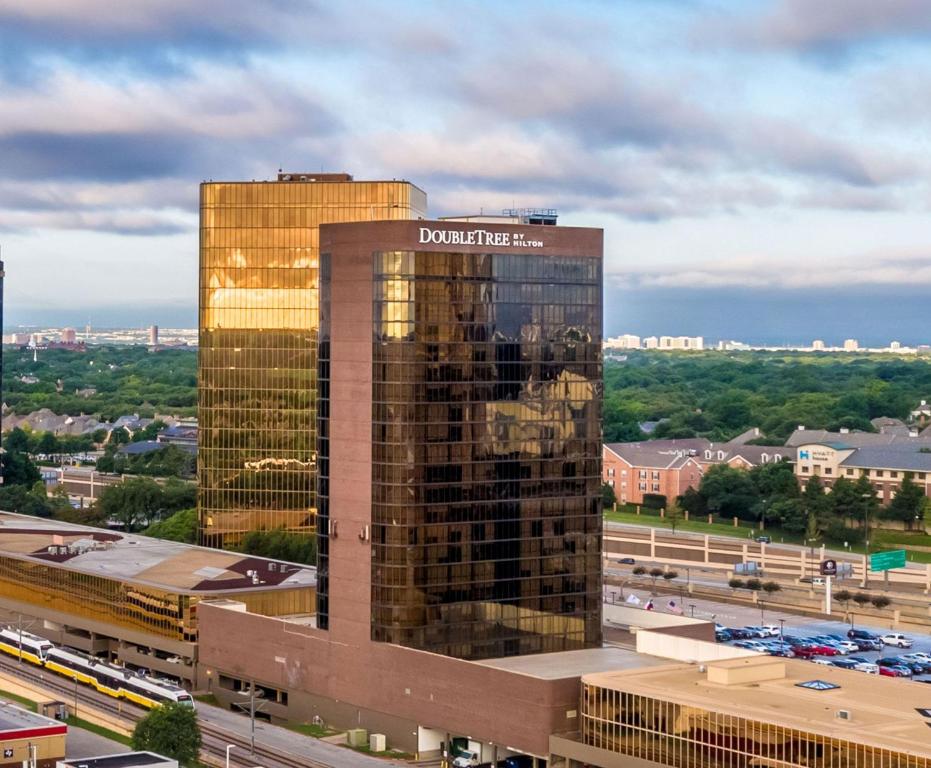a rendering of a tall building with the word drexel at DoubleTree by Hilton Hotel Dallas Campbell Centre in Dallas