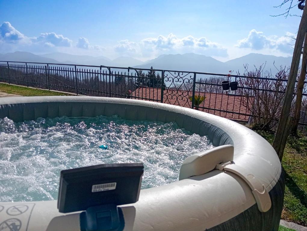 a jacuzzi tub with a tv in it at Al Pianaccio by Lago Reisen in Trarego Viggiona