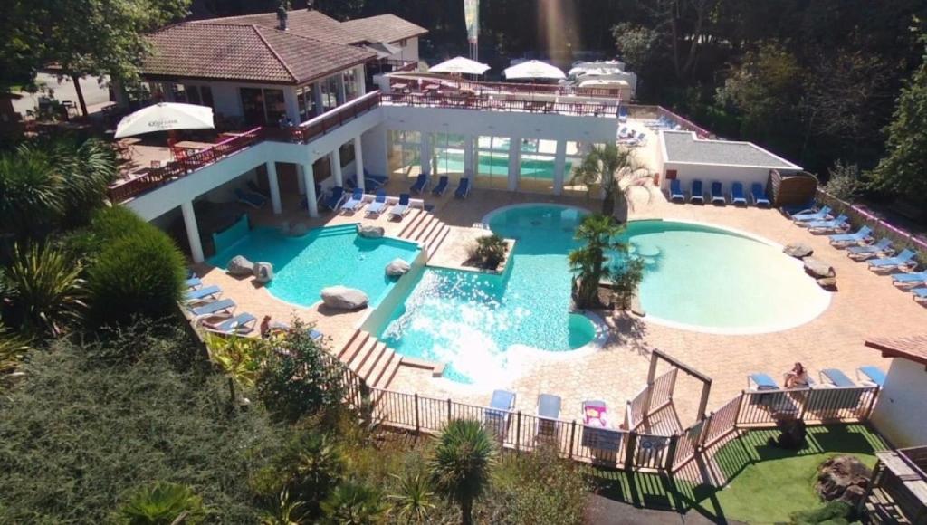 an aerial view of a swimming pool at a house at ZEcamping 4 animaux acceptés hammam sauna piscine et soirées animées in Espelette