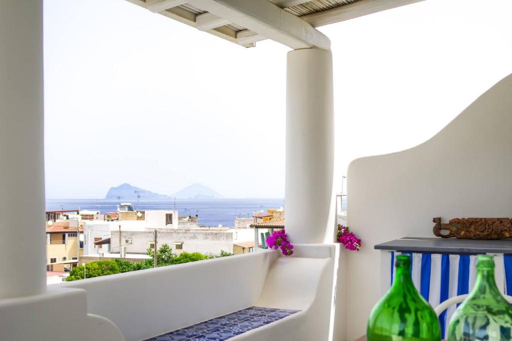 a balcony with a view of the ocean at Villa Giannetta in Canneto