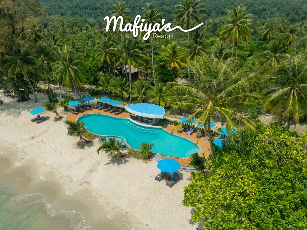 an aerial view of the beach at the maldives resort at Mafiya Resort in Koh Rong Island