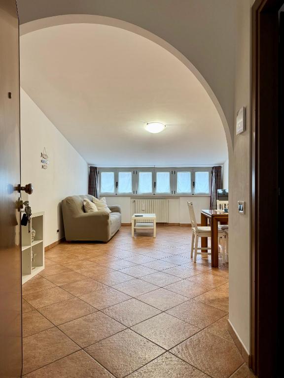 a living room with a couch and a table at Sole & Mare in Montesilvano