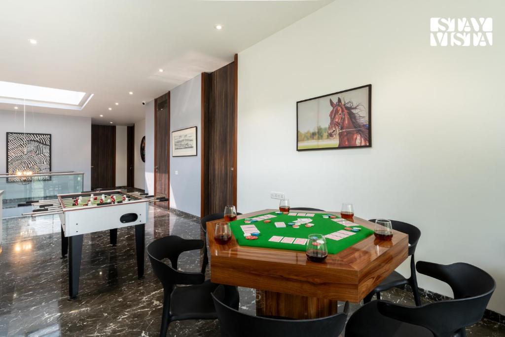 StayVista at Sapphire Shores Beachfront Villa with Lawn, Pool