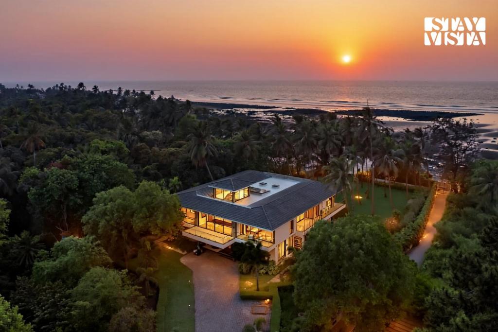 StayVista at Sapphire Shores Beachfront Villa with Lawn, Pool