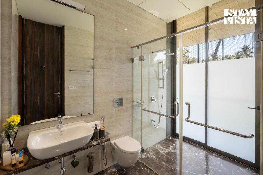 StayVista at Sapphire Shores Beachfront Villa with Lawn, Pool