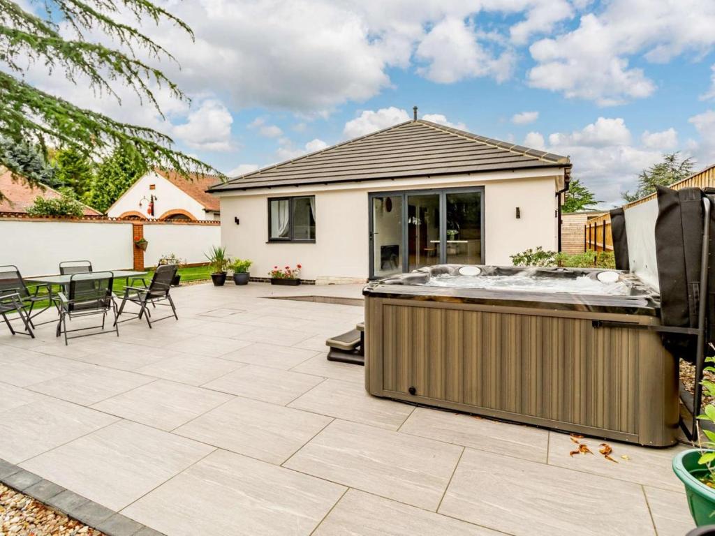 a backyard with a hot tub and a patio at 2 Bed in Hull oc-89596 in Ryhill