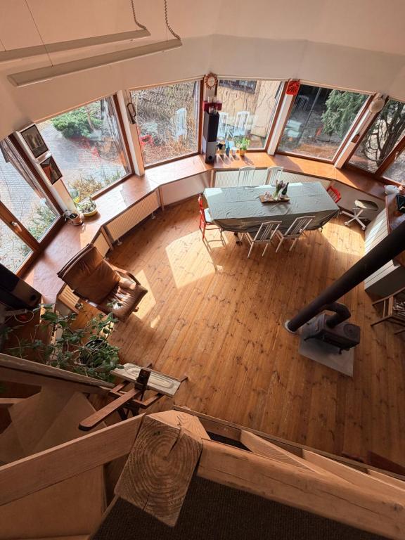 an overhead view of a living room with a table at Art space Bundulis in Saulkrasti