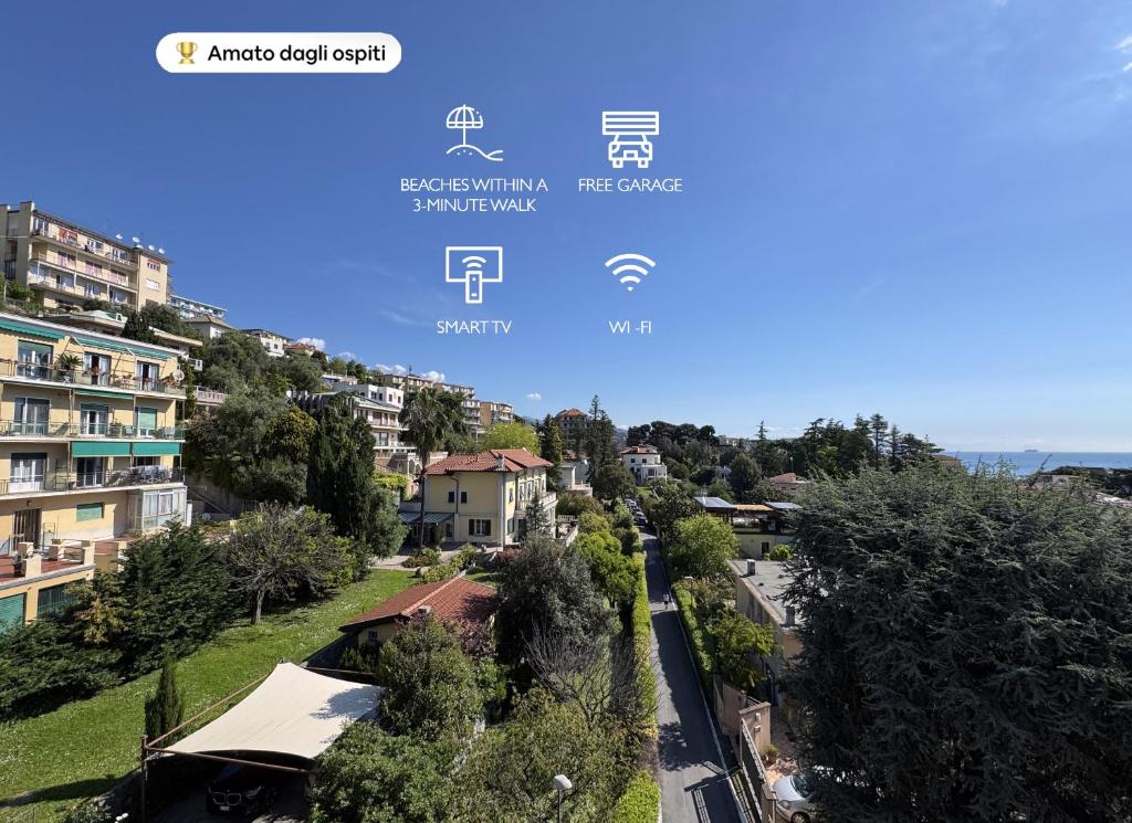 a view of a city with buildings and trees at Albissola Vista Mare in Albissola Marina