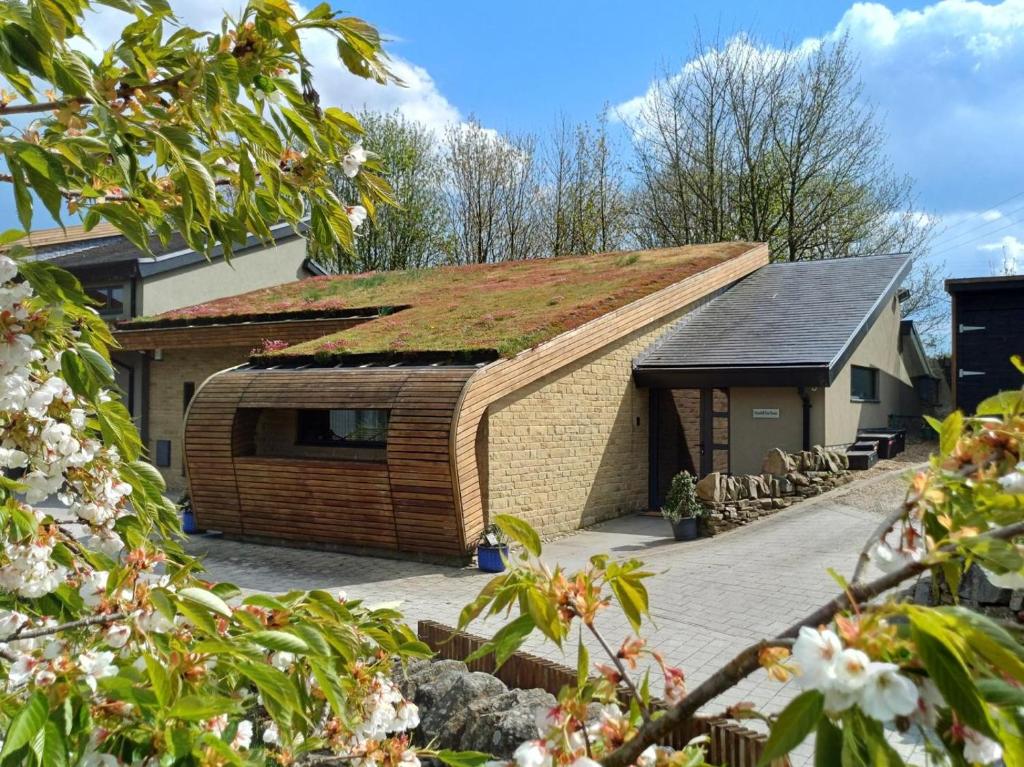 a building with a grass roof on top of it at 3 Bed in Sheffield oc-94342 in Thurlstone