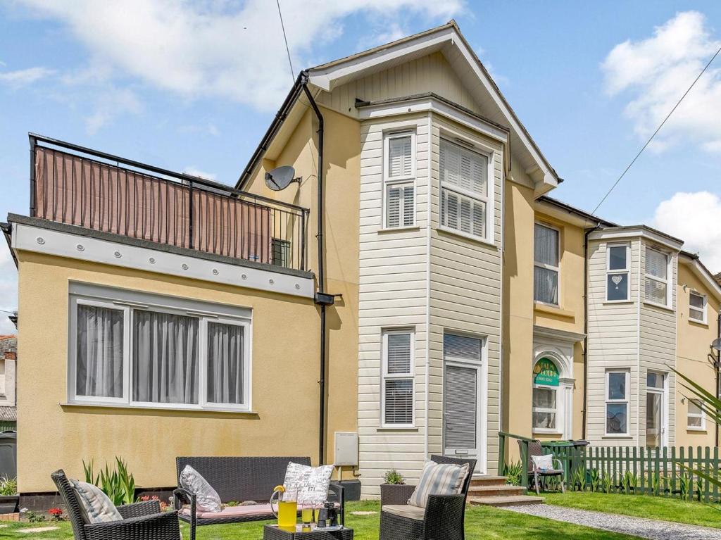 a house with chairs in front of it at 2 Bed in Shanklin oc-78239 in Shanklin