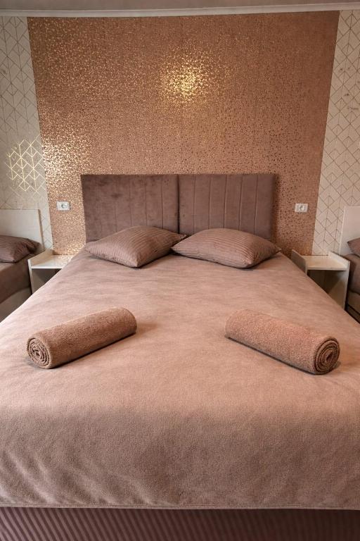 Ліжко або ліжка в номері AmA