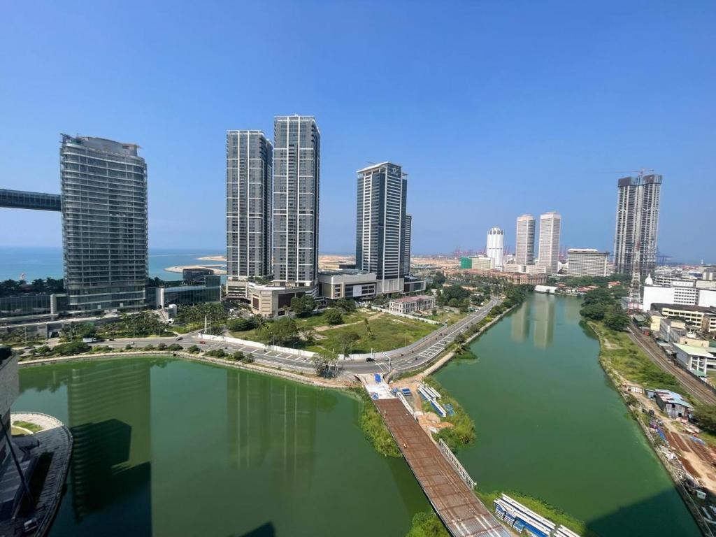 an aerial view of a city with tall buildings at Cinnomon Life Residence Tower 20 3 in Colombo
