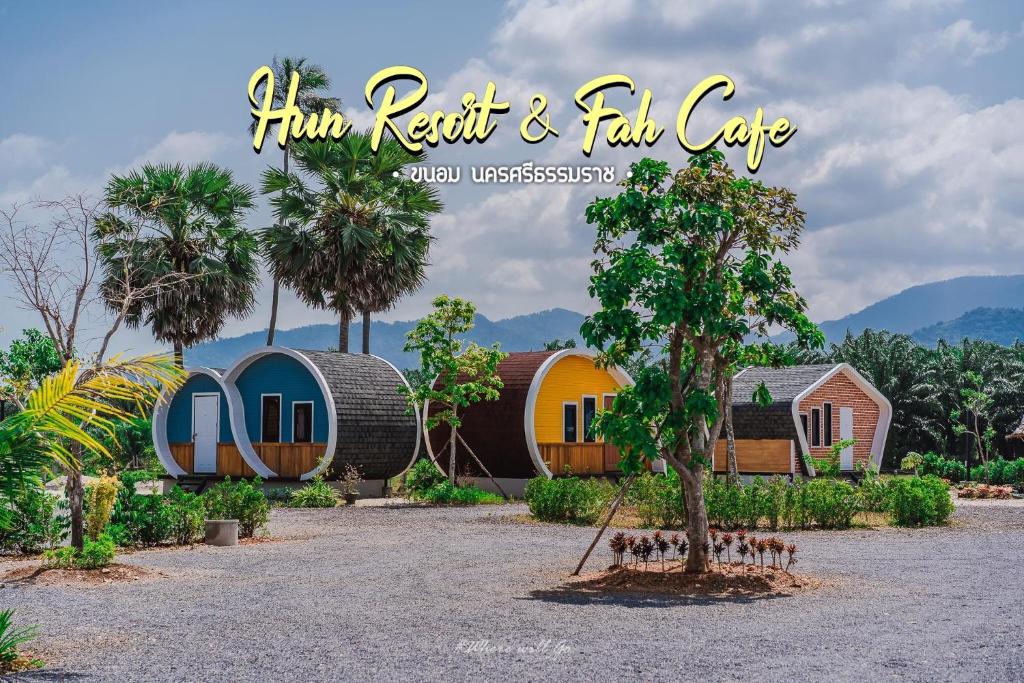 a rendering of a row of homes with a tree at Hun Resort in Khanom