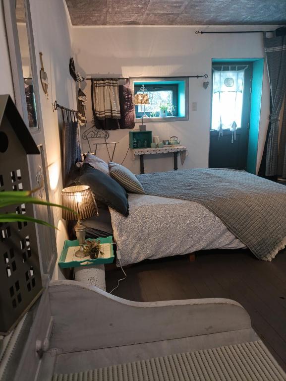 Chambre poésie tesisinde bir odada yatak veya yataklar