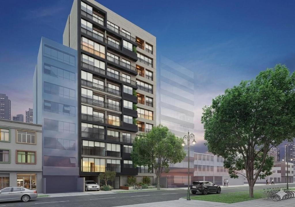 an architectural rendering of a tall building at Exclusive Mariano Santos 179 Residences by Geko in Lima