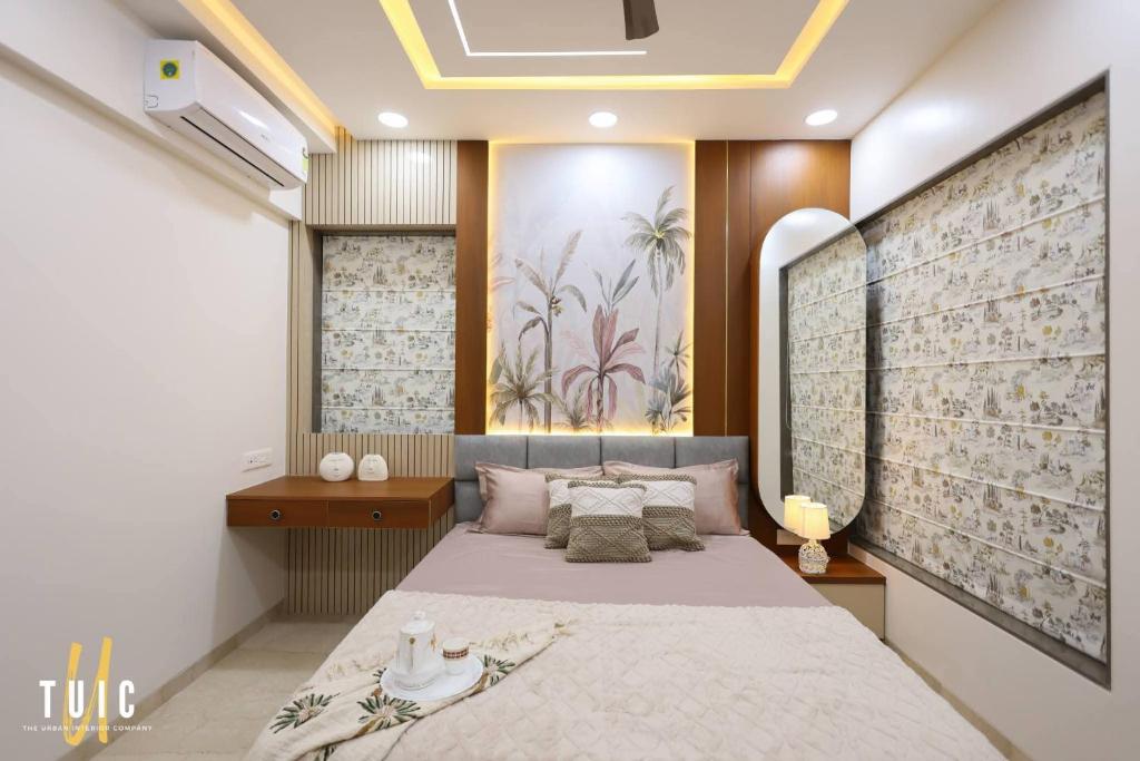 a bedroom with a bed and a painting on the wall at Hotel Q victoria palace #tajmahal corridor & hotel lane in Agra