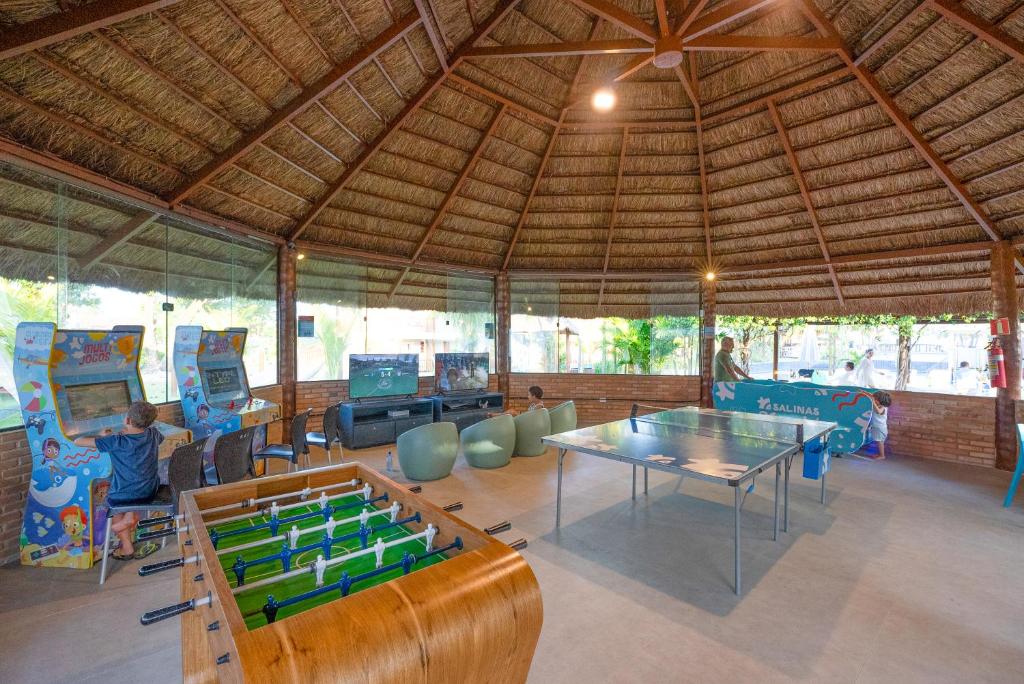 a room with a ping pong table and games at Salinas Maceio All Inclusive Resort in Maceió