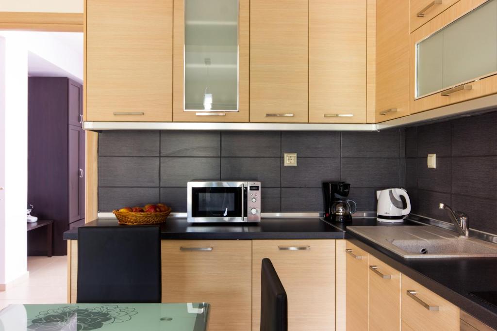 Kuchyň nebo kuchyňský kout v ubytování Bivas Apartments