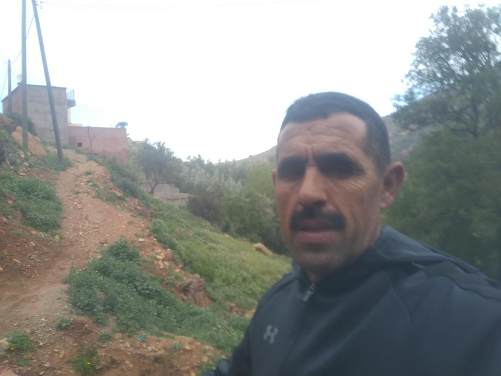 a man standing on top of a hill at Sidi hssain in Marrakesh