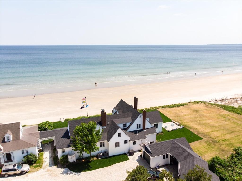 an aerial view of a house and the beach at Nautilus Beach House in Kennebunk