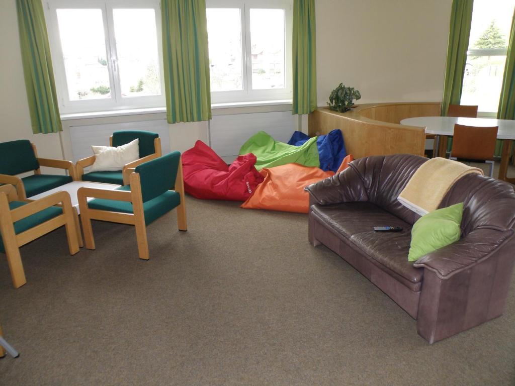 Posezení v ubytování Hotel Sommerhaus am Internats-Campus