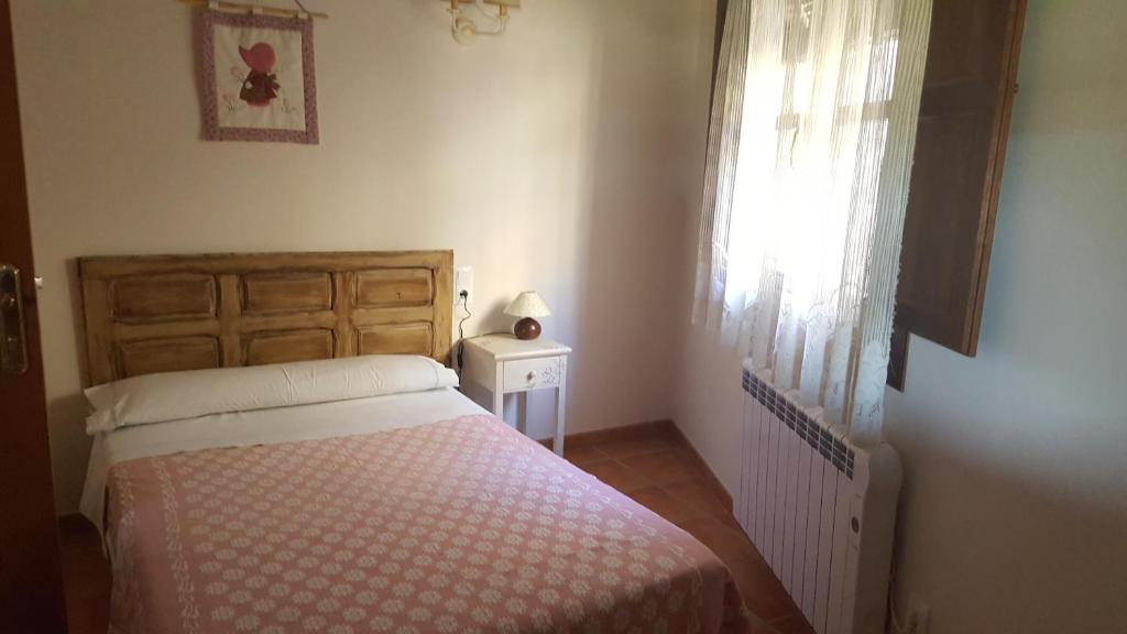 Postel nebo postele na pokoji v ubytování Casa Sampietro