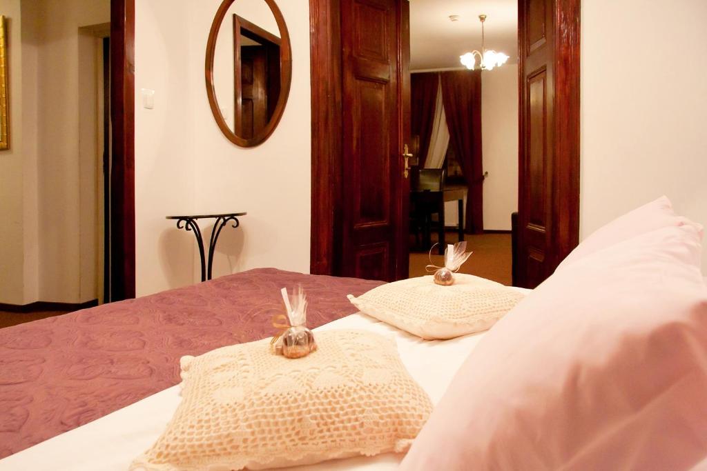 Postel nebo postele na pokoji v ubytování Hotel Pod Orłem