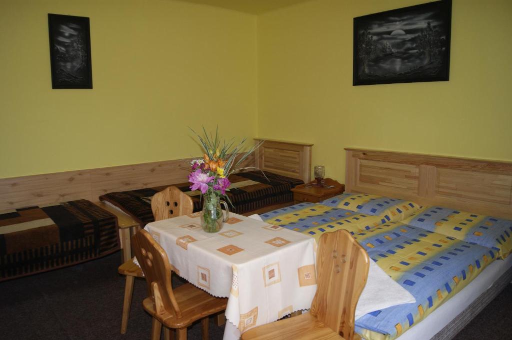Postel nebo postele na pokoji v ubytování Privat u Babky