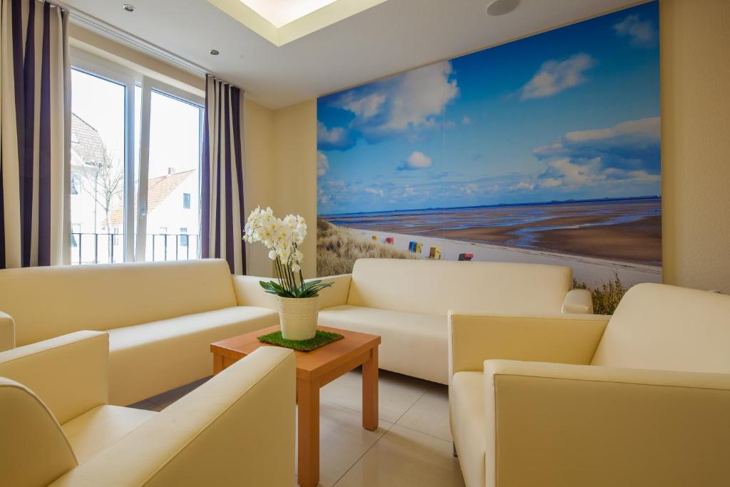 Posezení v ubytování Moin Hotel Cuxhaven