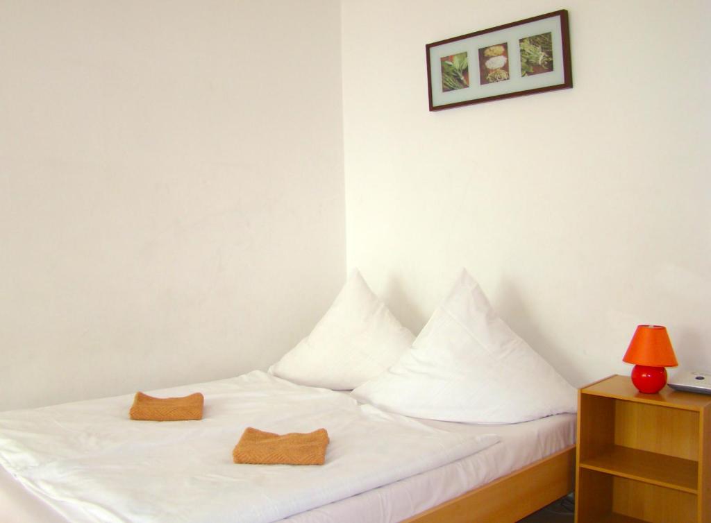 Postel nebo postele na pokoji v ubytování Rooms & Apartments near Zoologischer Garten