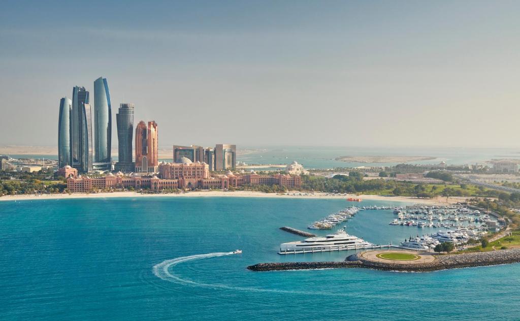 an aerial view of a harbor with boats in the water at Emirates Palace Mandarin Oriental, Abu Dhabi in Abu Dhabi