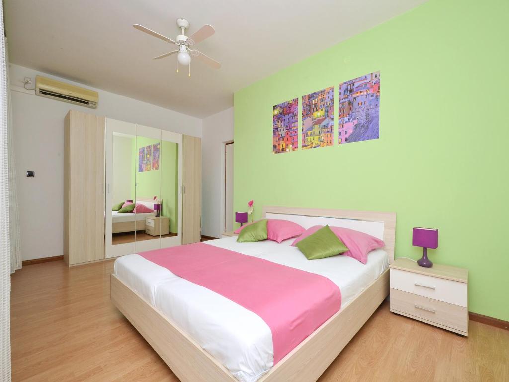 Posteľ alebo postele v izbe v ubytovaní Apartment T&M