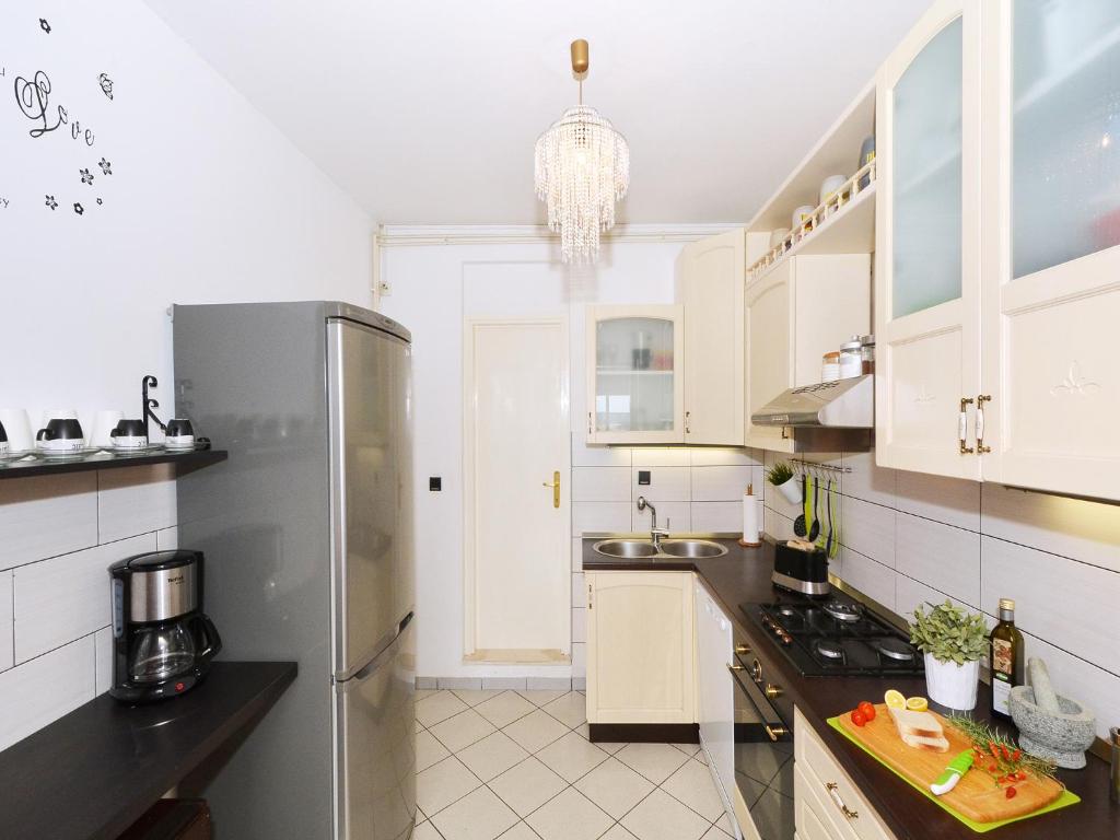Kuchyňa alebo kuchynka v ubytovaní Apartment T&M