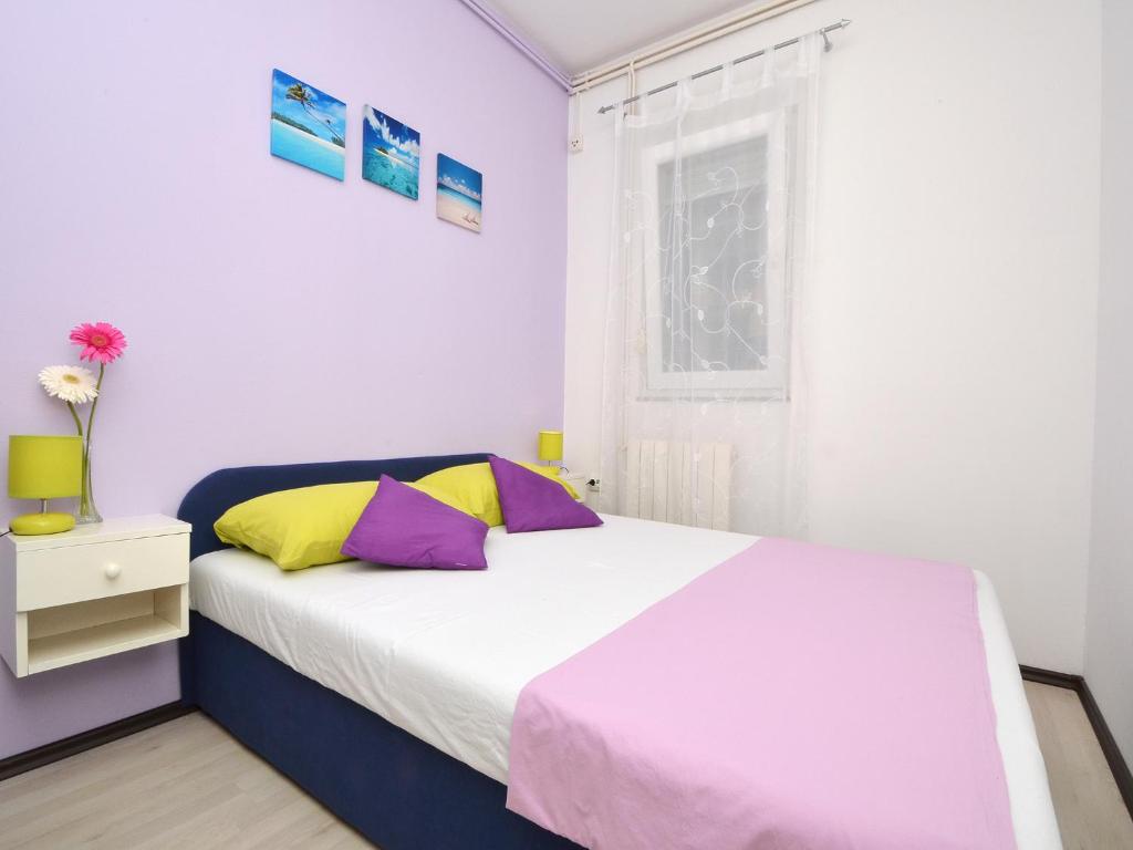 Posteľ alebo postele v izbe v ubytovaní Apartment T&M