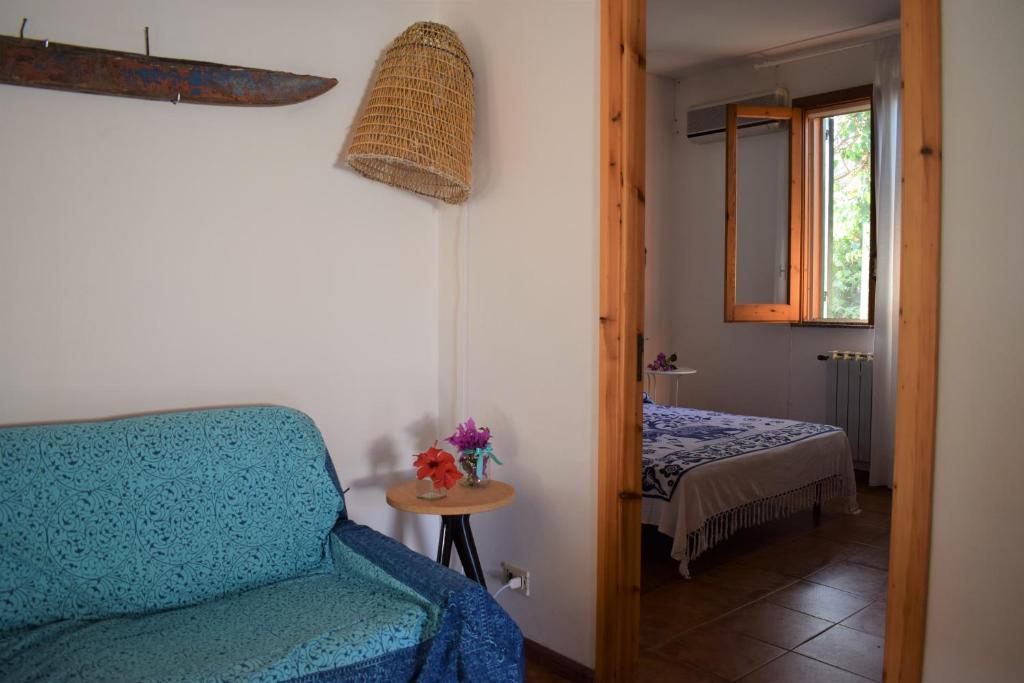 Postel nebo postele na pokoji v ubytování Casa Bedda