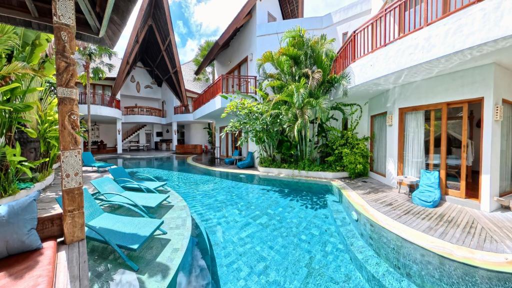 an image of a swimming pool in a villa at Villa Manureva in Canggu