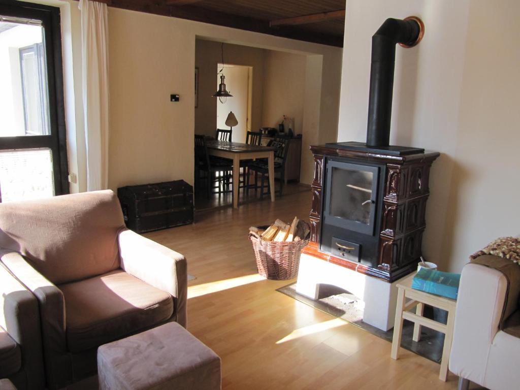 Posezení v ubytování Vakantiehuis Reuzengebergte