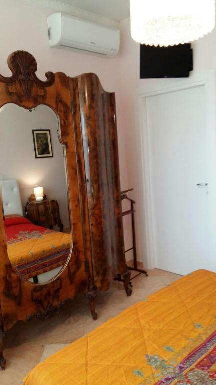 Postel nebo postele na pokoji v ubytování B&B Domus Lupiae