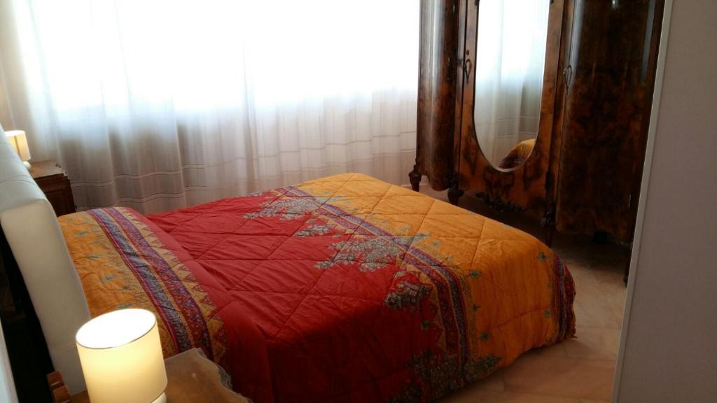Postel nebo postele na pokoji v ubytování B&B Domus Lupiae