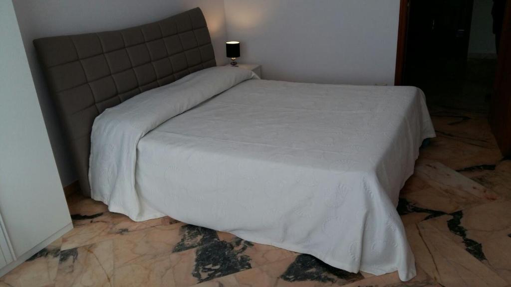 Postel nebo postele na pokoji v ubytování B&B Domus Lupiae