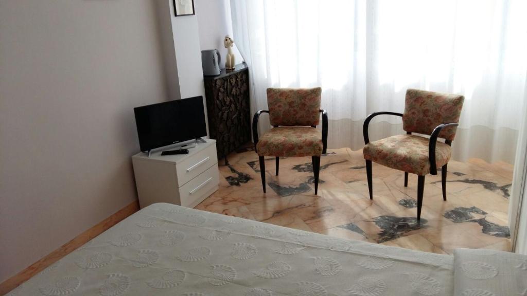 TV a/nebo společenská místnost v ubytování B&B Domus Lupiae