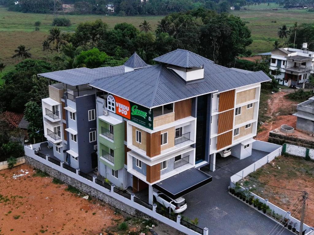 an overhead view of a building with a roof at Veedu and Co Greens in Cochin