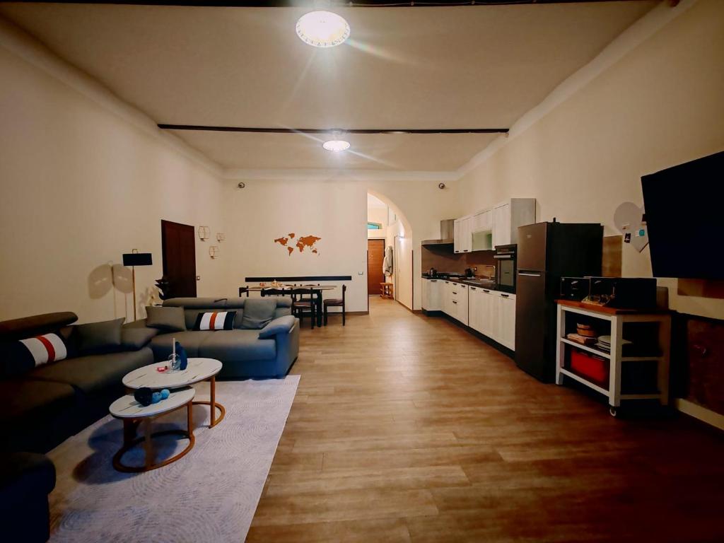 a living room with a couch and a table at Lissy Casa Vacanze in Lamezia Terme