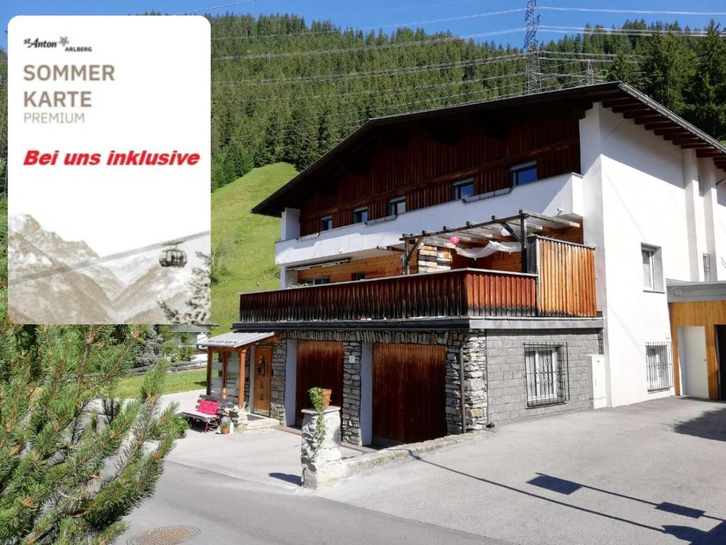 an image of a house with a sign that reads summer kate real units initiative at Lodge Seppaler - Sommerkarte Premium inklusive in Sankt Anton am Arlberg