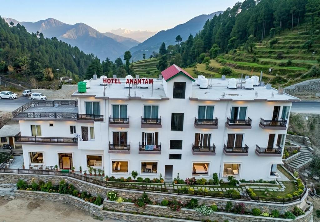 a hotel with a view of the mountains at Hotel Anantam Residency in Uttarkāshi
