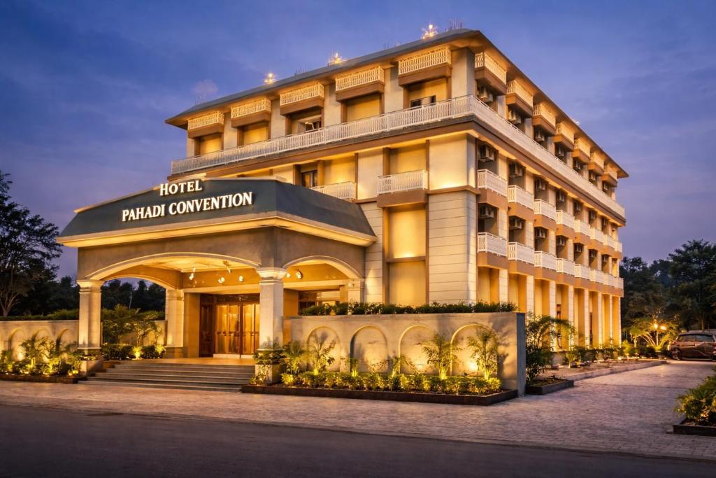 a hotel building with a sign that reads hotel convention at Pahadi Convention in Rourkela