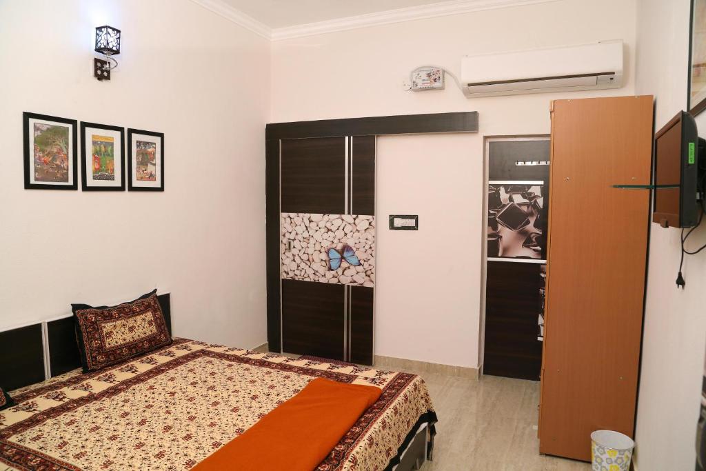 Cama o camas de una habitación en Tuk Tuk Homestay