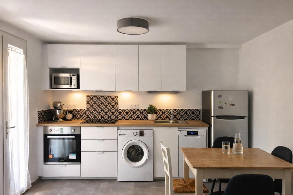 Kuchyň nebo kuchyňský kout v ubytování Maison Thany 2