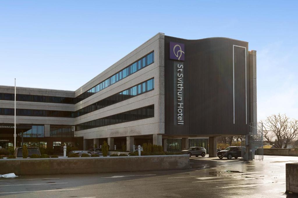 a building with a sign on the front of it at Best Western St Svithun Hotell in Stavanger