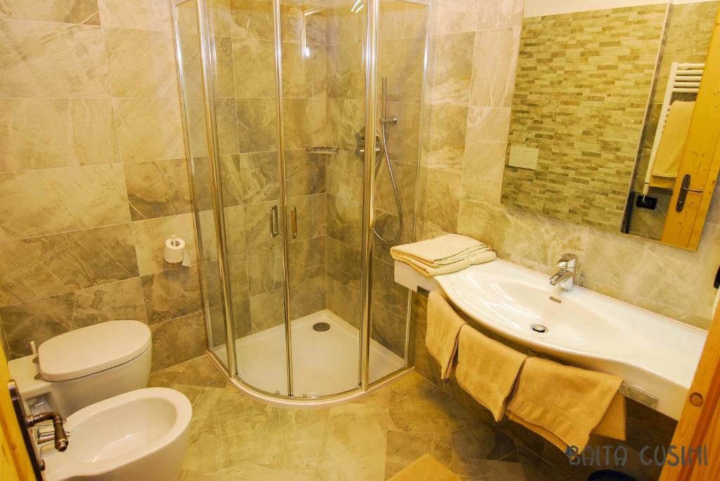 Koupelna v ubytování Residence Baita Cusini